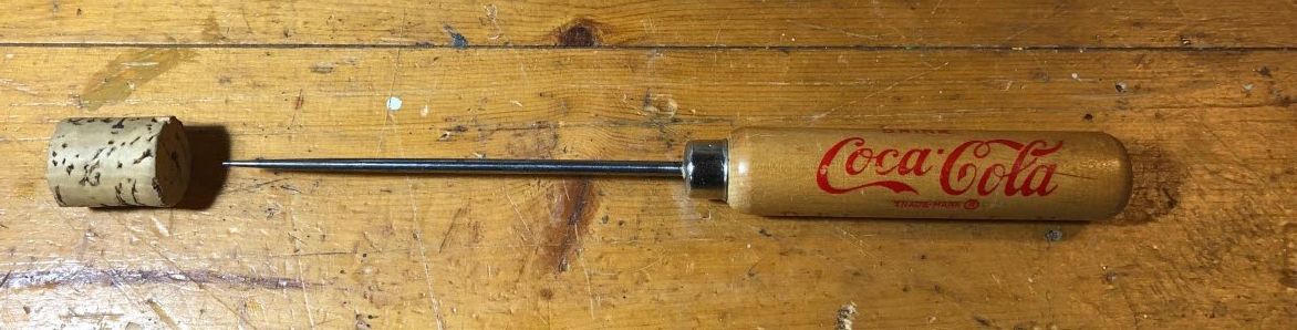 Ice pick with cork tip protector
