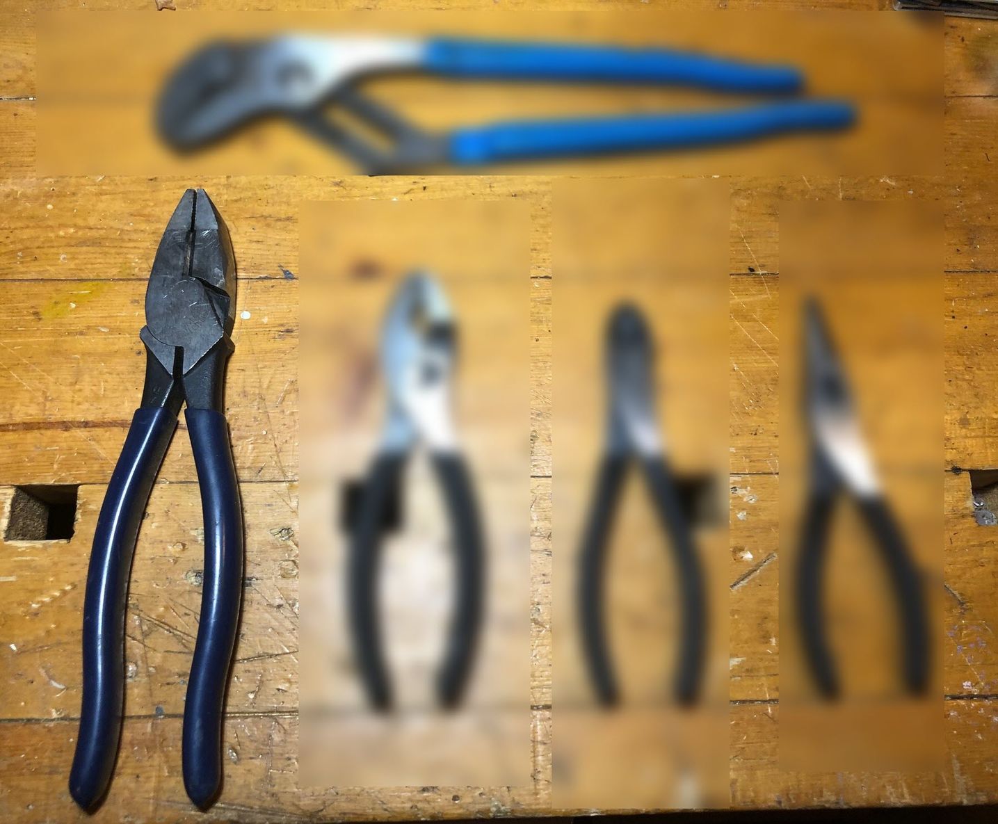 Klein Tools linesman pliers on the left