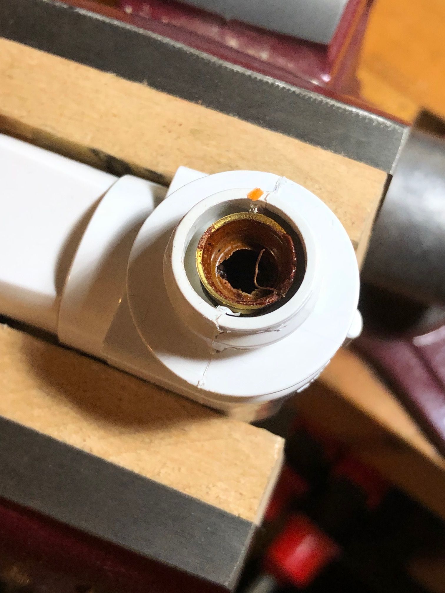 Removing the base of a broken light bulb