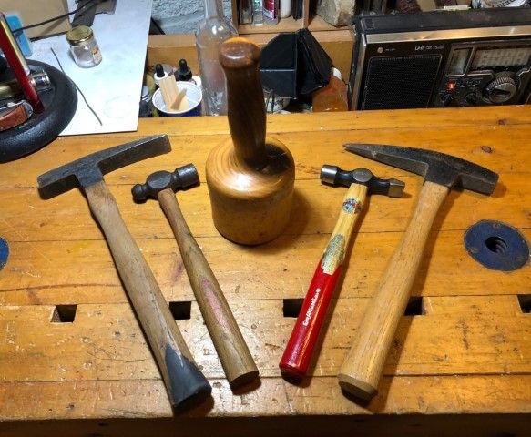 Some of my hammers. From the left - masons, ball peen, lignum vittate mallet, cross peen and geologist