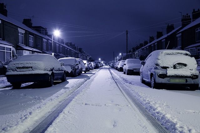 Snow-covered street ready for the snowplow