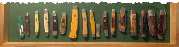 Photograph illustrating a few of the many shapes, sizes and styles of pocketknives