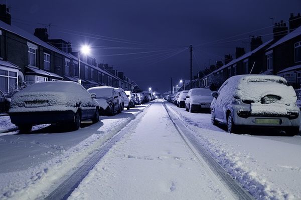 Snow-covered street ready for the snowplow